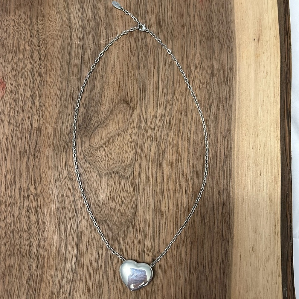Birk’s sterling silvers 16 inch chain wth heart. Heart slides on chain.